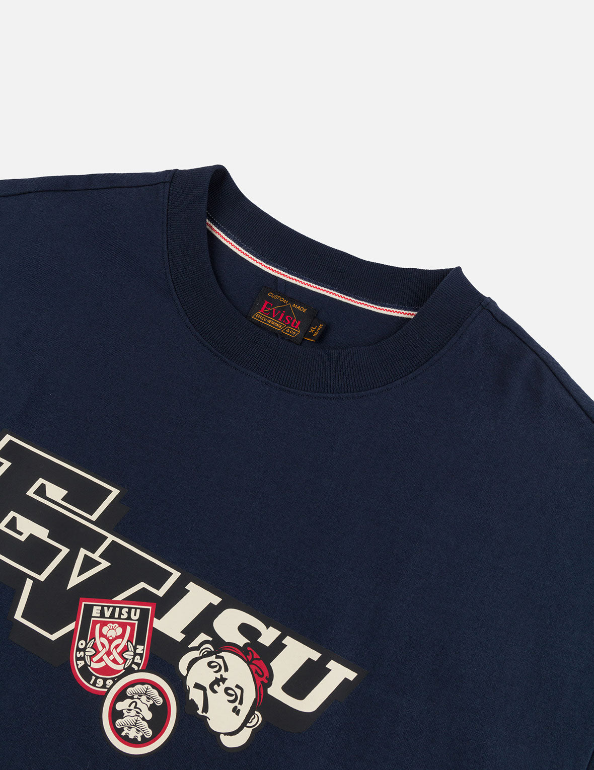 文字绘佛头和智慧之轮标签大M印花宽版休闲T恤