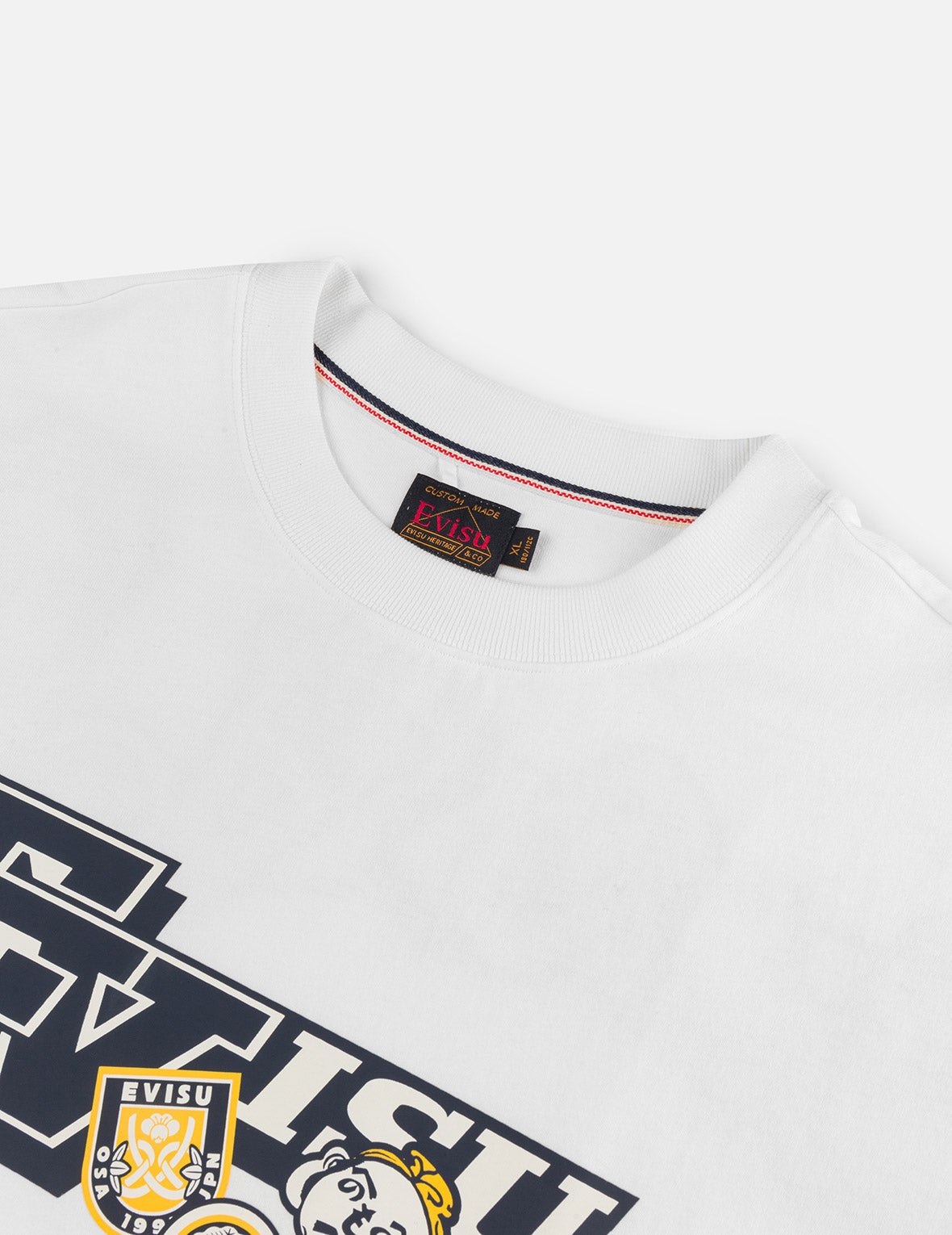 文字绘佛头和智慧之轮标签大M印花宽版休闲T恤