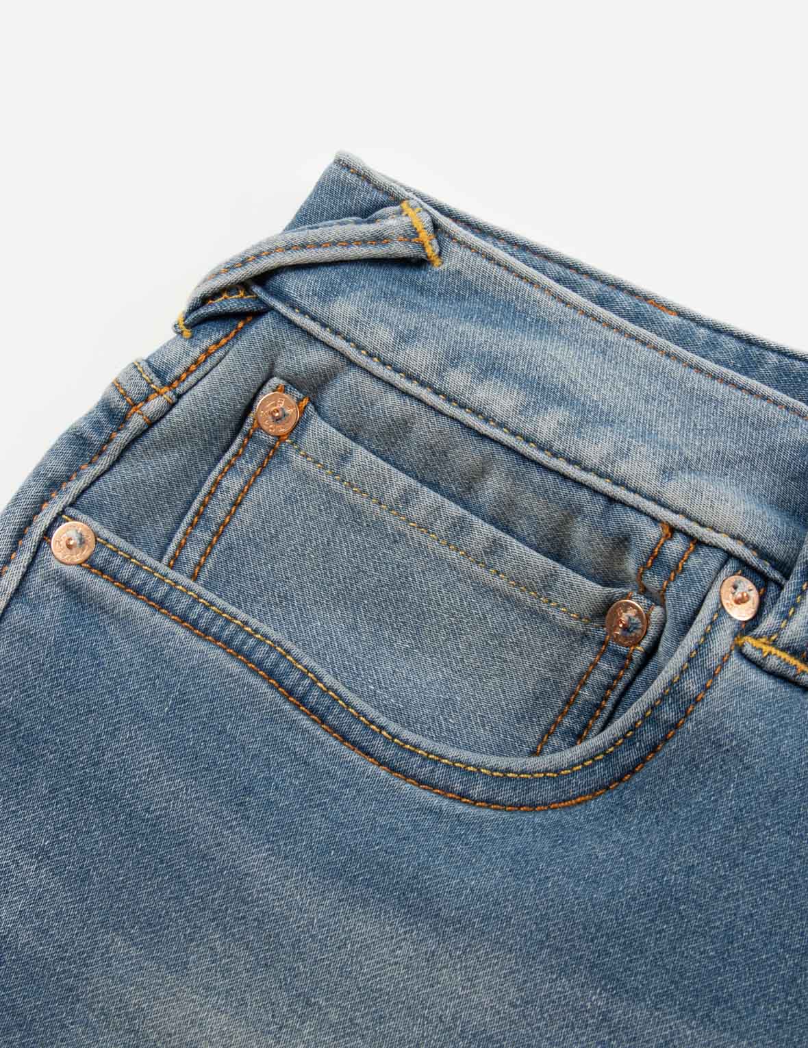 家花印花口袋休闲宽版牛仔裤