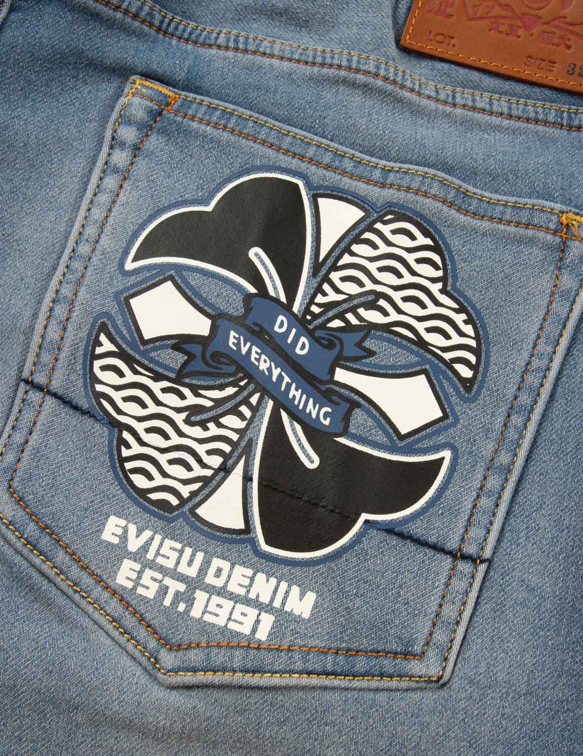 家花印花口袋休闲宽版牛仔裤