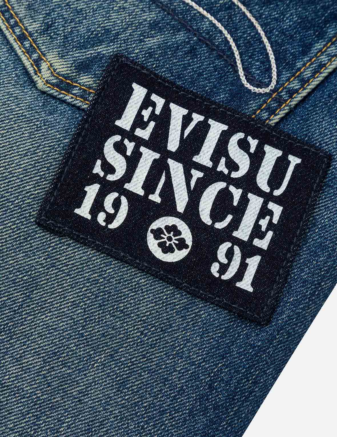 海鸥刺绣和"EVISU SINCE 1991"印花贴布窄脚牛仔裤 #2017