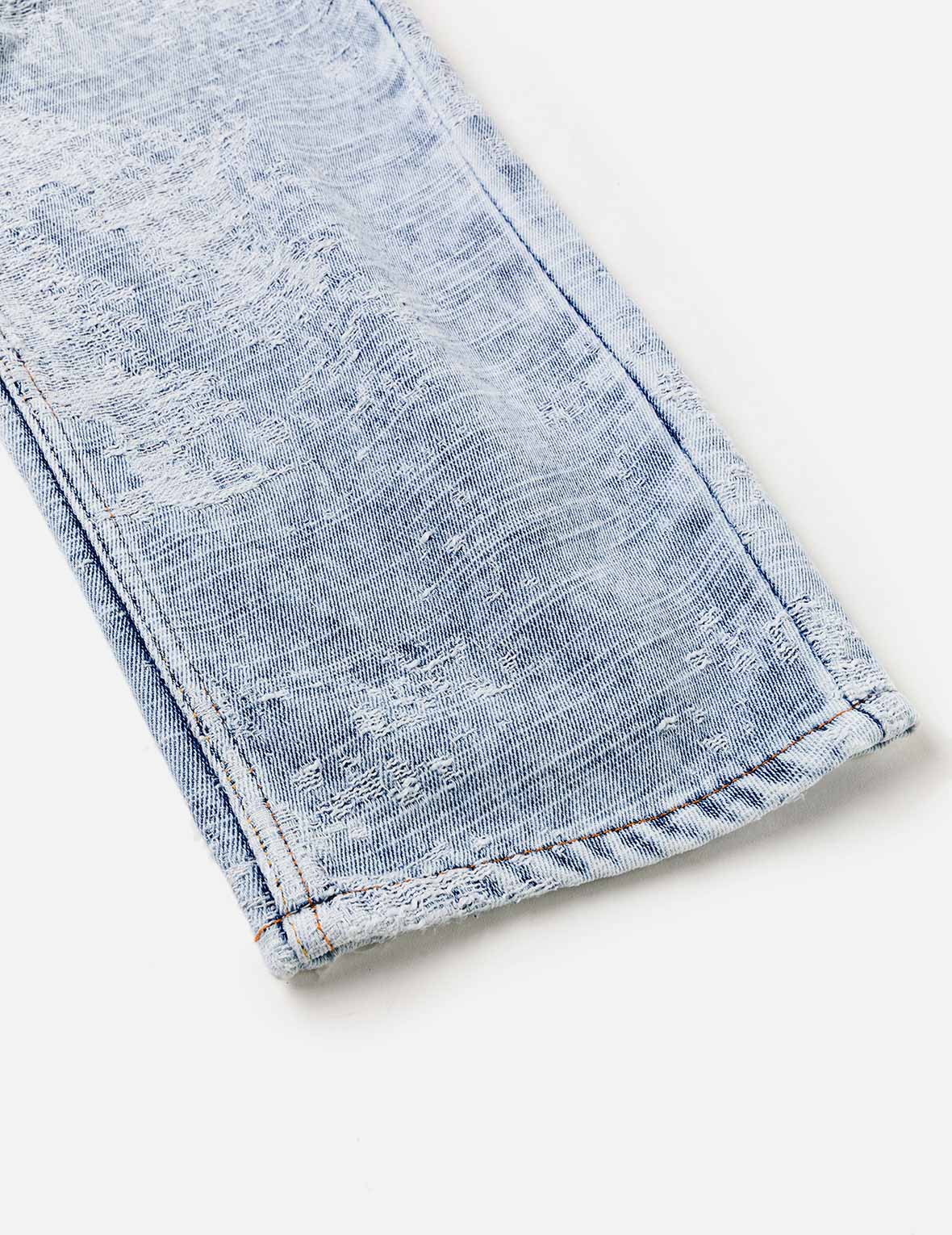 做旧海鷗弯刀牛仔裤