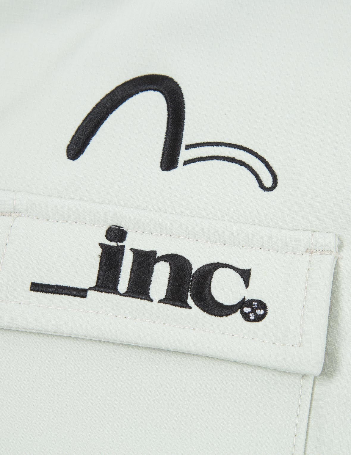 撞色口袋海鸥刺绣长裤