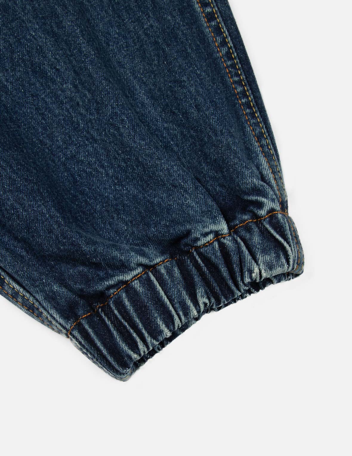 智慧之轮印花束口阔腿牛仔裤