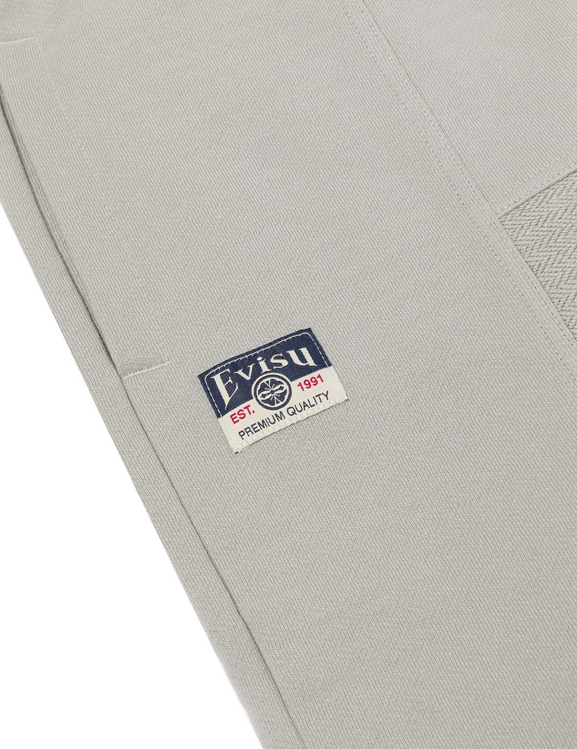 家花贴布和错位车缝时尚版型运动裤