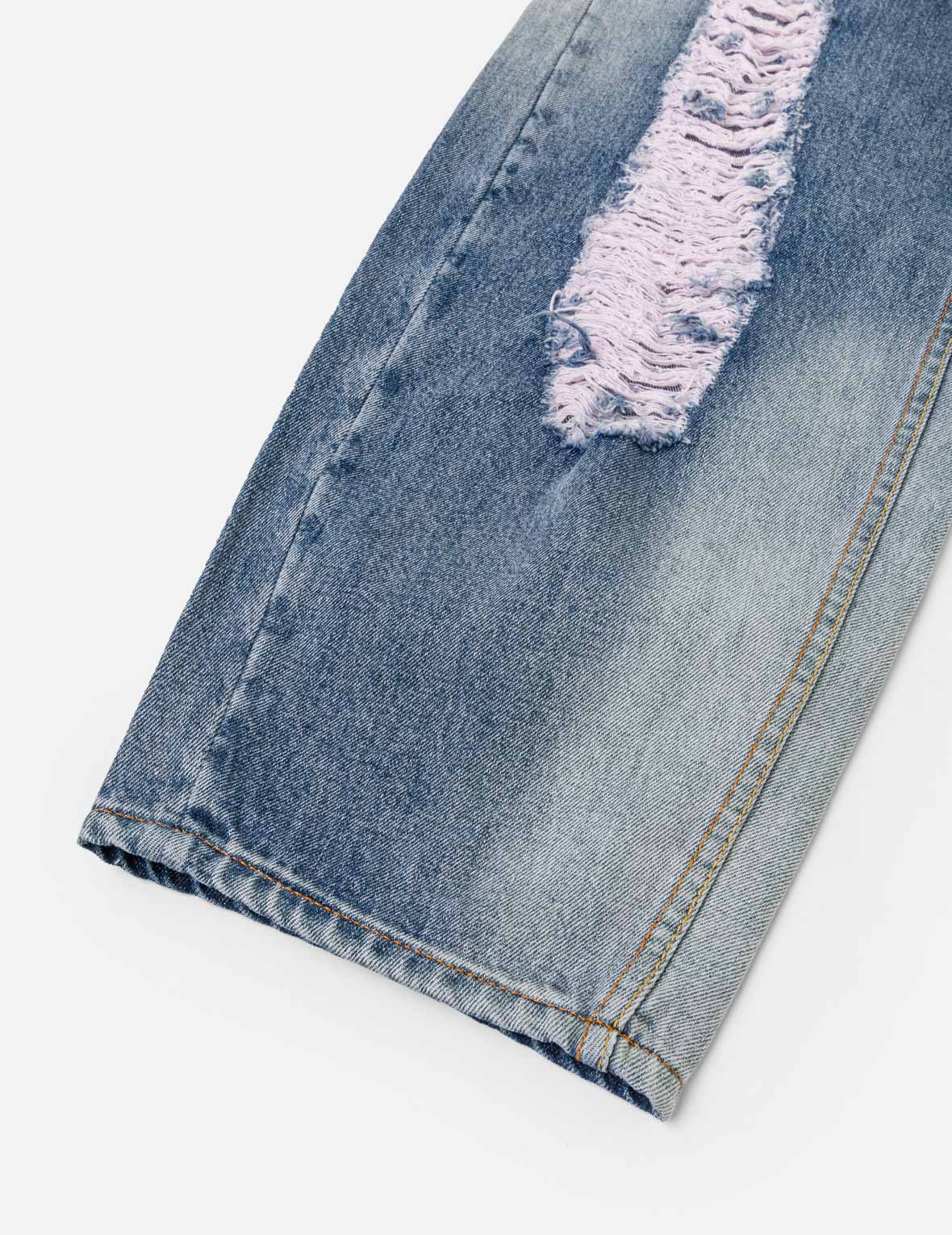 做旧大 M 弯刀牛仔裤