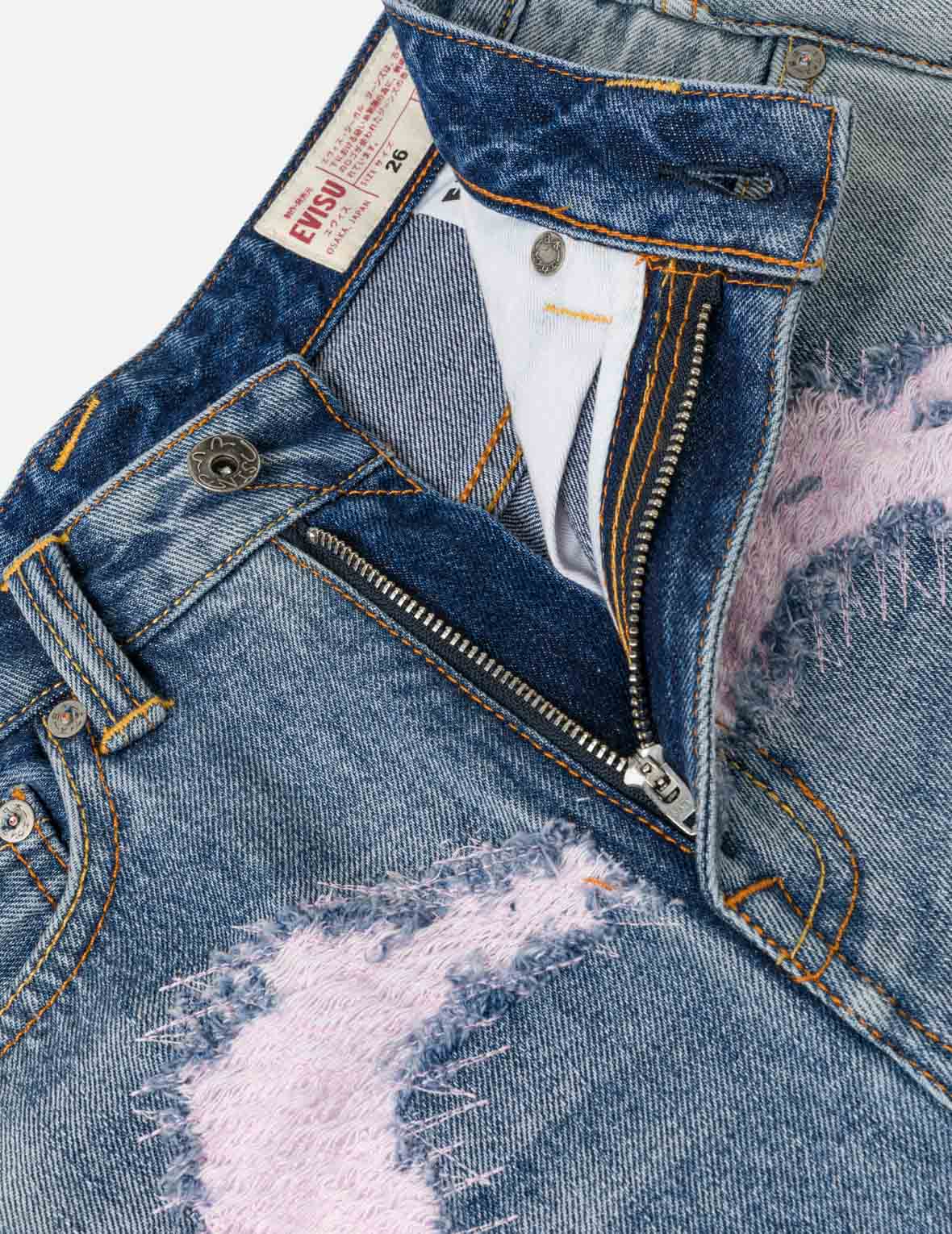 做旧大 M 弯刀牛仔裤