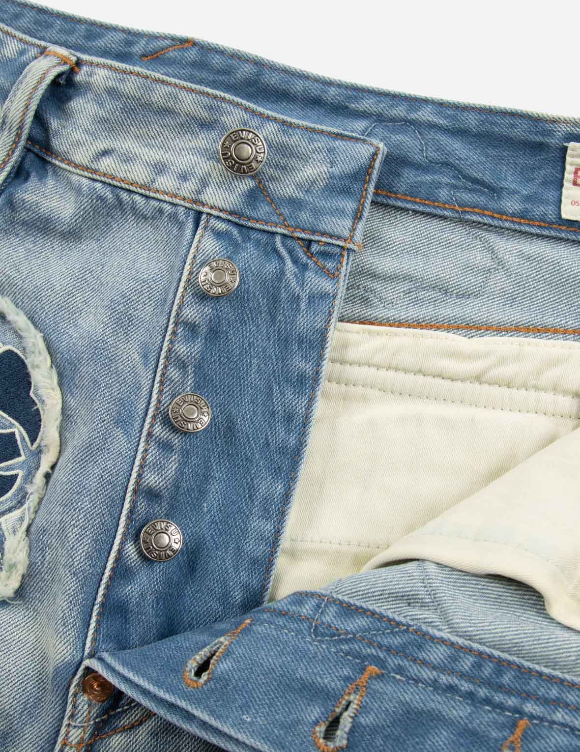MultipleBadgesDeconstructed Relax Fit Jeans